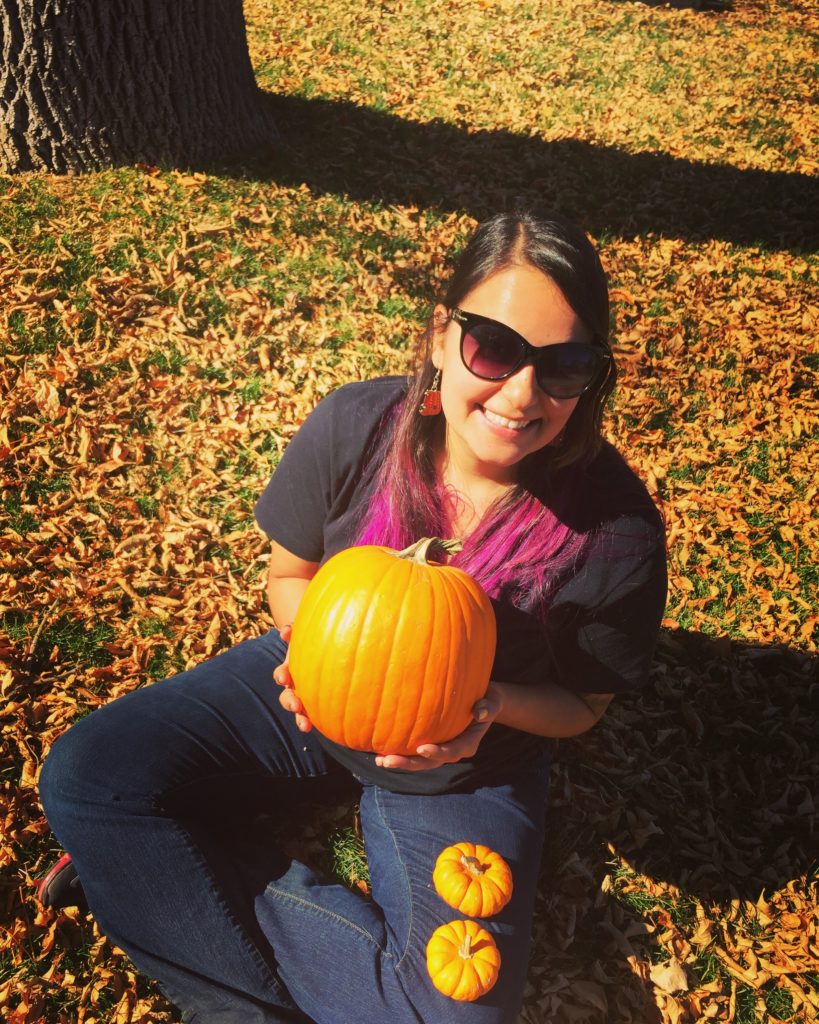Yes, I did pose with my pumpkins in a mass of fall leaves.